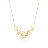 14K gold necklace with five small open flower charms displayed – elegant and minimalist.