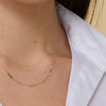 Minimalist 14K gold necklace with three infinity symbol charms