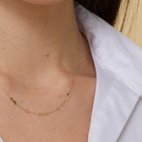 Minimalist 14K gold necklace with three infinity symbol charms
