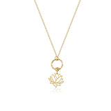 Elegant 14K gold necklace featuring a textured circle and a lotus flower pendant