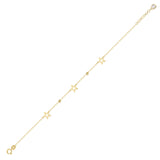 Close-up of a 14K gold bracelet with hollow star charms and gold beads