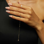 Minimalist 14K gold bracelet with repeating infinity symbols,