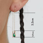 14K gold threader earrings with green teardrop gemstone drops on fine chain