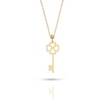 14K gold necklace with a key-shaped pendant featuring a four-leaf clover design,