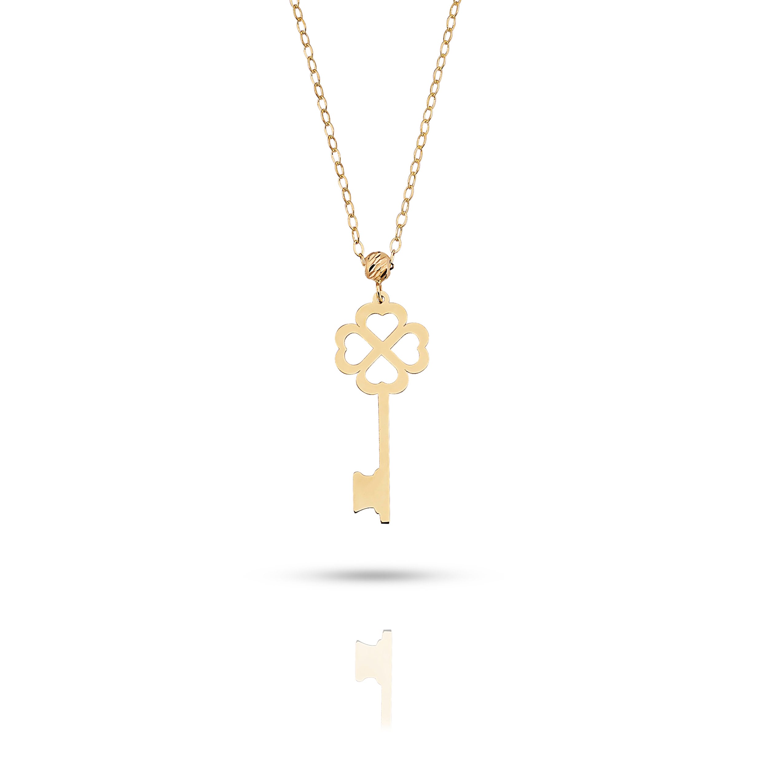 14K gold necklace with a key-shaped pendant featuring a four-leaf clover design,