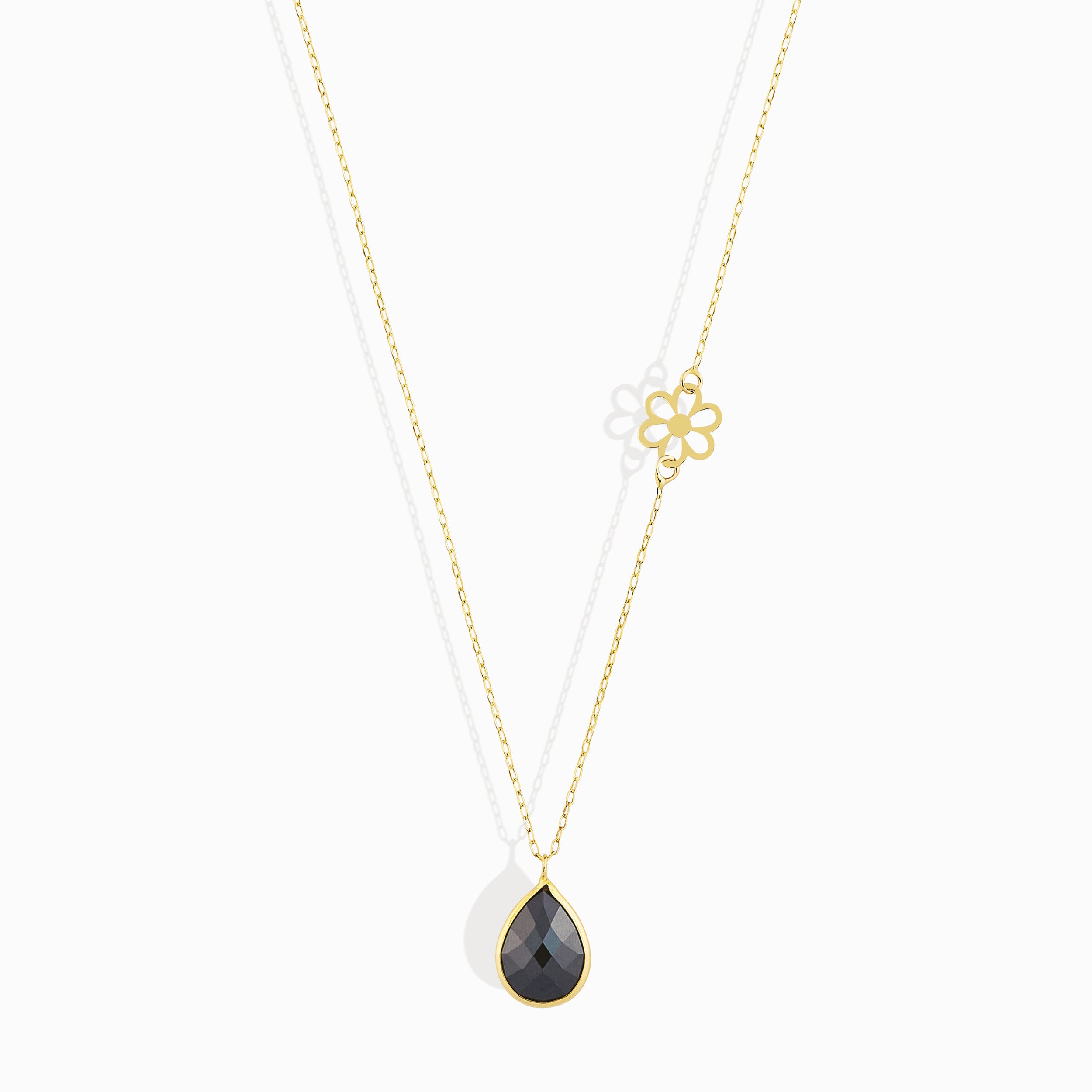 Elegant 14K gold necklace with black onyx teardrop pendant