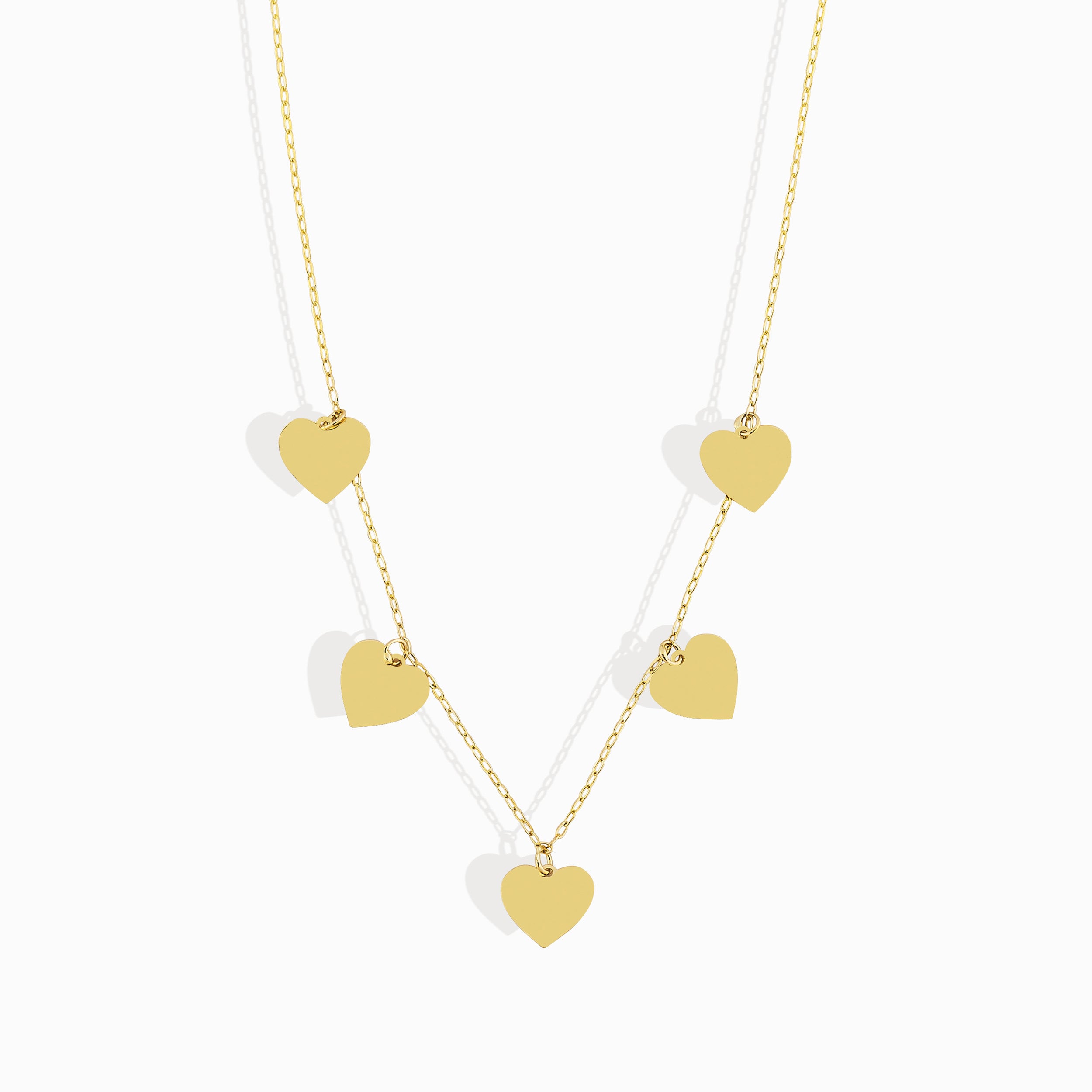 Multiple heart charm necklace in 14K gold
