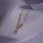 14K gold bracelet with elongated marquise-shaped link elements,