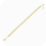 14K gold bracelet with circular disc charms and crystal beads displayed