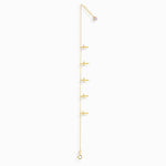 14K gold bracelet featuring five minimalist cross charms white background
