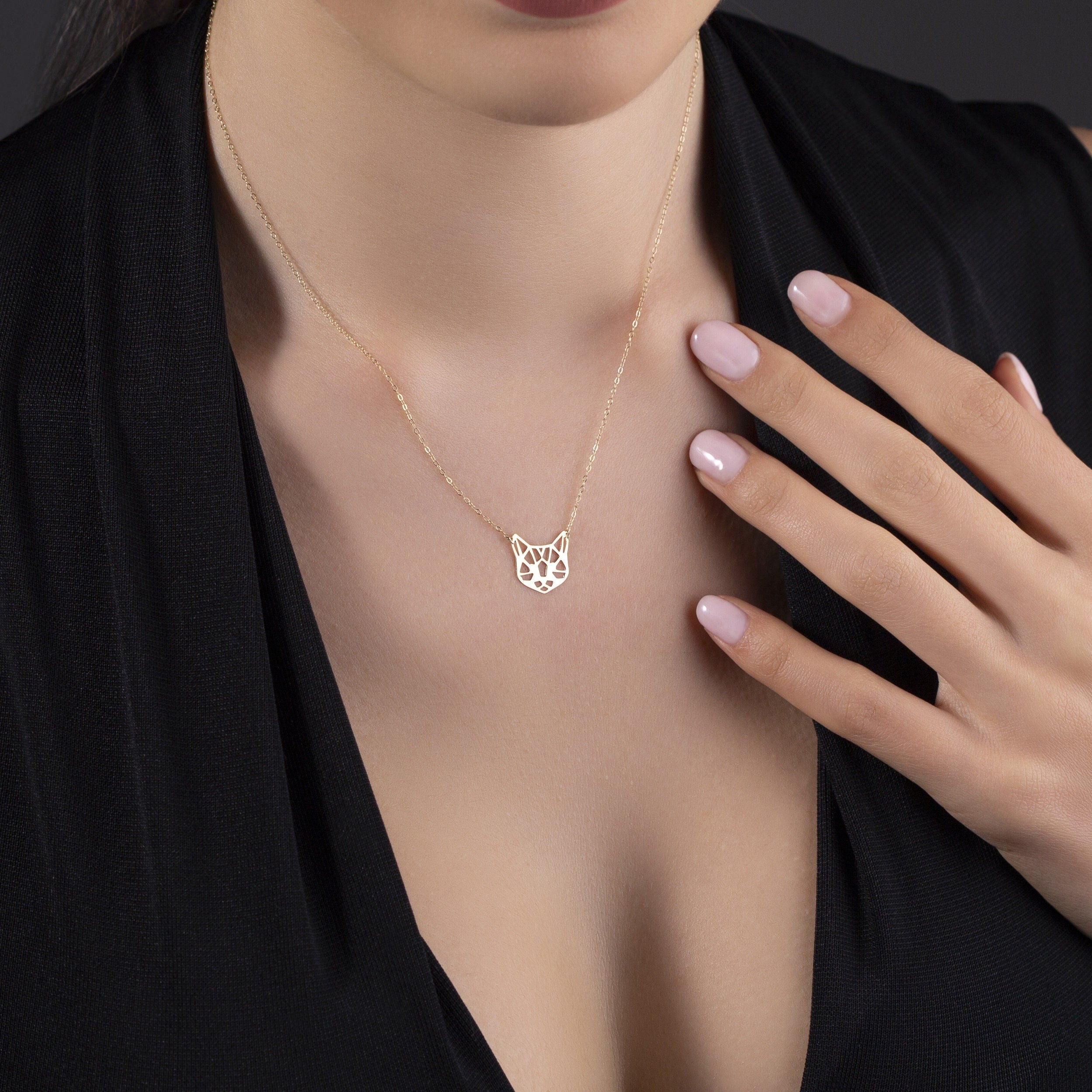 Solid 14K gold geometric cat face pendant necklace on delicate chain
