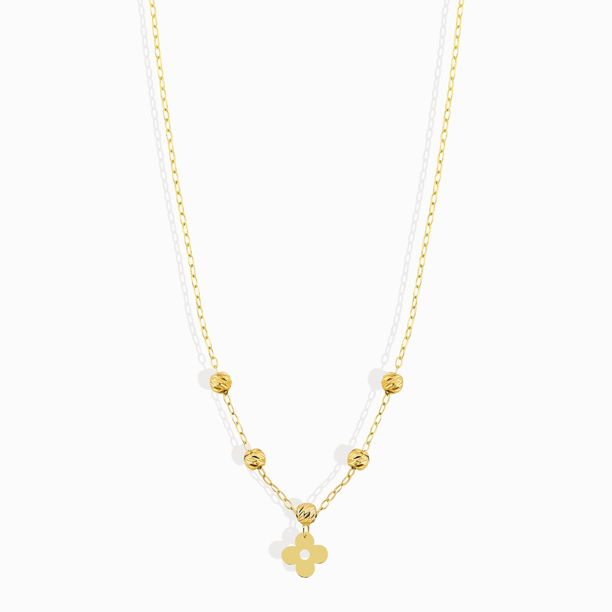 Minimal 14K gold clover charm necklace with polished gold beads,