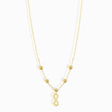 Minimalist 14K gold necklace with an infinity pendant and textured beaded chain,