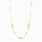 Minimalist 14K gold necklace with three infinity symbol charms