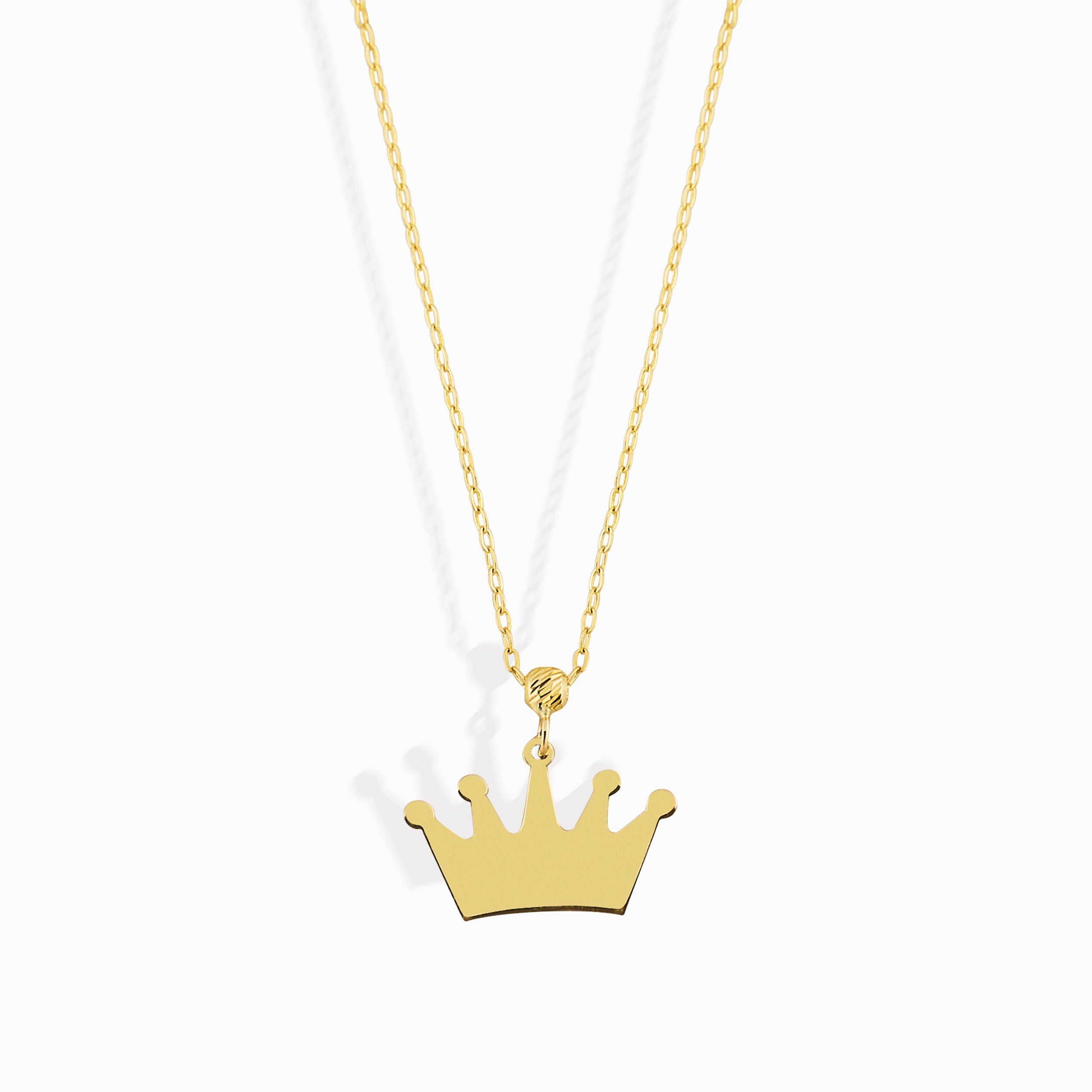 14K gold necklace with a polished crown-shaped pendant