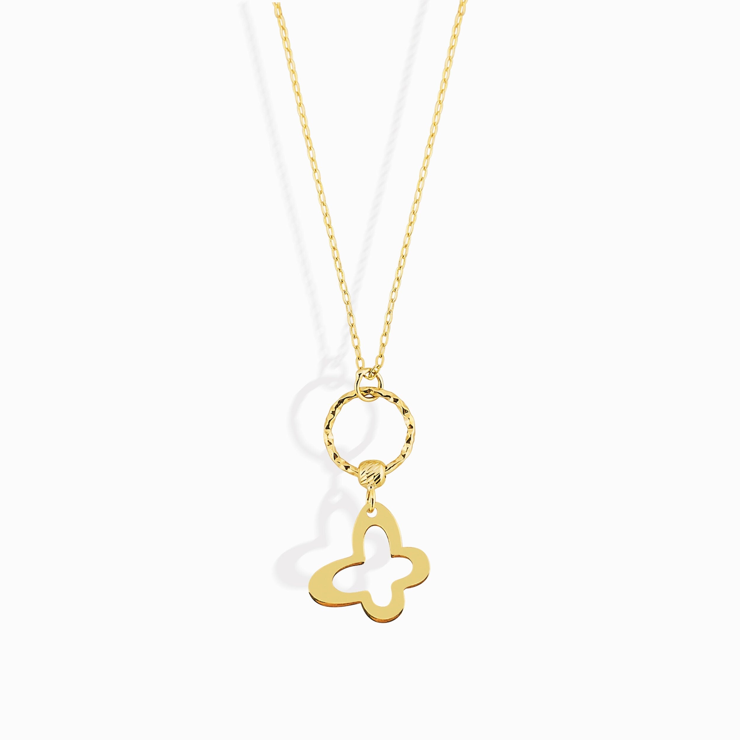 Minimal 14K gold necklace featuring a four-leaf clover charm hanging from a twisted circle,