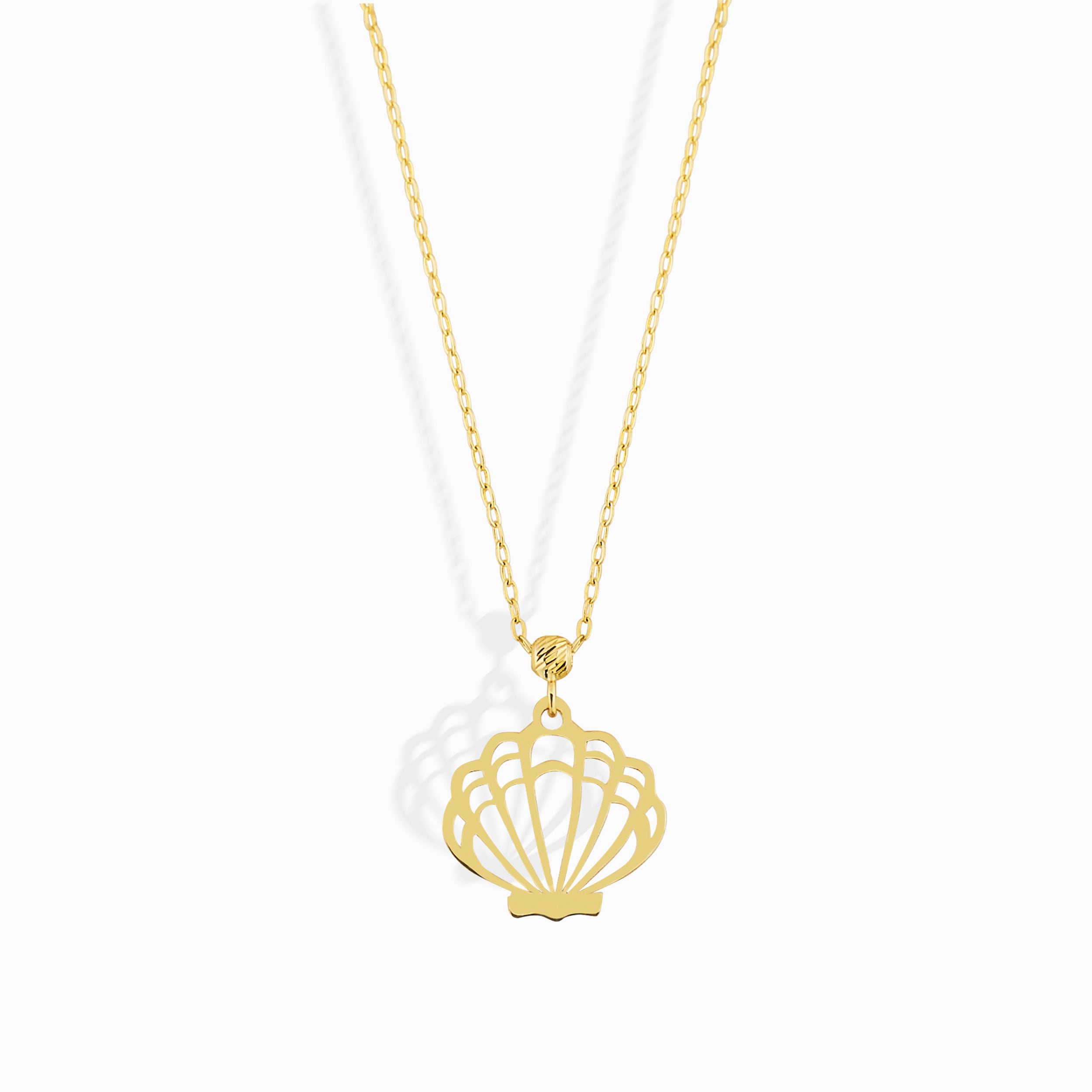 14K solid gold necklace featuring a delicate seashell pendant