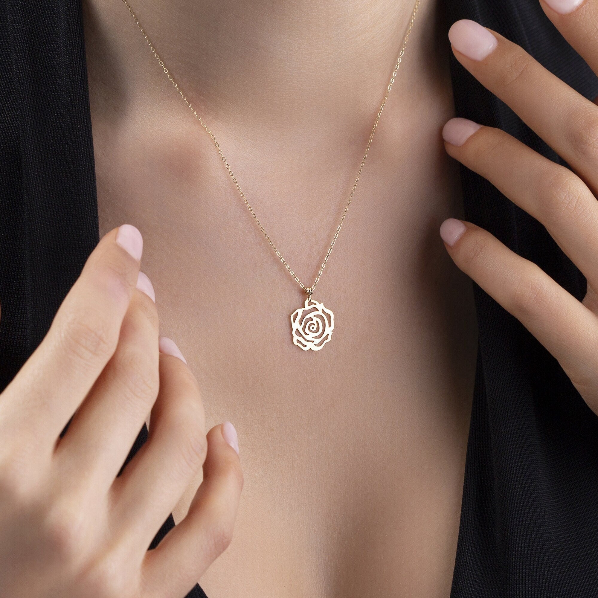Delicate 14K gold necklace with an openwork rose flower pendant