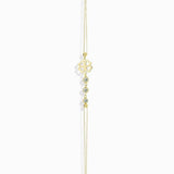 14K gold bracelet with four-leaf clover charm and gemstone details