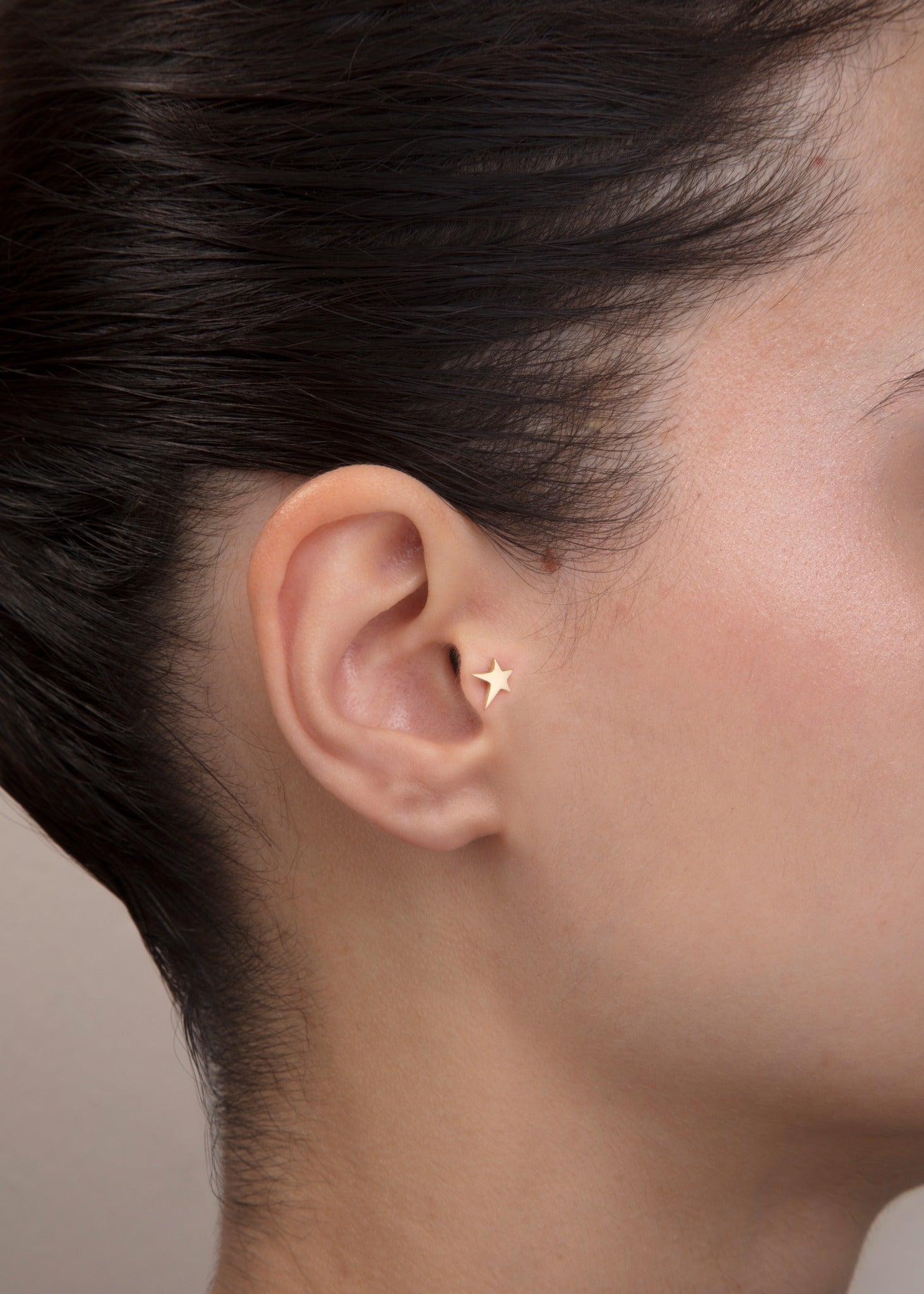 polished 14k yellow gold star flat back labret stud